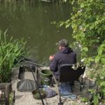 Angler fishing from a peg on the coarse lake at Brooklands